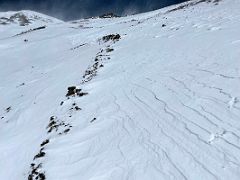 09A The overnight heavy snowfall hid the trail on the descent from Yuhin Peak summit 5100m above Ak-Sai Travel Lenin Peak Camp 1 4400m